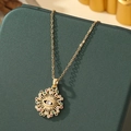 Golden Evil Eye necklace with sunburst pendant and multicolor stones on leather jewelry box - A7-Gold