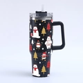 Detail of 40oz stainless steel tumbler with Christmas penguin and polar bear patterns - White Polar Bear and Christmas Tree
