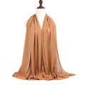 Detail showing the brown pearl chiffon hijab with natural folds and soft drape texture - 175*75cm / Coffee