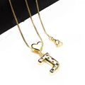 Detailed shot of gold plated letter J pendant with colorful zircons and heart charm - Pendant with Necklace / Letter J