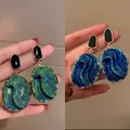 Detail of oil-dripping oval earrings changing from blue-green to deep blue tones - Silver Needle - Blue Green Color Changing Oil Painting Earrings (HE6365)