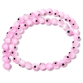 Strand of pink glass Evil Eye beads for DIY jewelry making and bracelet crafting - Pink