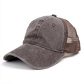 Close-up of vintage washed dark brown trucker hat showing breathable mesh and cotton fabric - Coffee