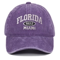 Close-up of white Florida 1822 embroidery on purple washed cotton baseball cap - Purple