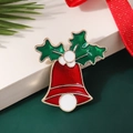 Miniature Christmas bell brooch with red enamel and holly leaf details on white gift box - Style 17
