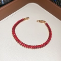 Close-up of elegant 18k gold-plated ruby bracelet with a secure snap clasp in a luxury box - Gold-Red Rectangle (HB5100)