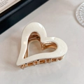 Minimalist white heart hair clip with gold metal spring clamp for elegant styling - White Heart Claw