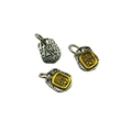 Three Tibetan style alloy pendants with vintage silver and gold relief details - US 5