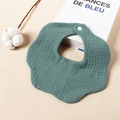 Detail of 6-layer muslin cotton petal bib featuring soft Morandi cyan fabric and snap button - 7 Blue