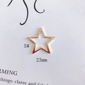 Detailed view of a 23mm golden hollow star charm for DIY jewelry making and earrings - 5# Gold 23mm