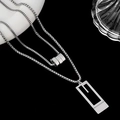 Detail of silver titanium steel double-layer necklace with geometric rectangular pendant - Silver