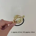 Minimalist knot design gold metal hair tie with black high-elastic rubber band - Knotted Design Gold