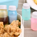 Mini plastic bento sauce bottles in multiple colors with white screw caps for lunch - Colorful Mini Bottles Set of 4
