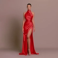 Elegant red satin maxi dress featuring a halter neck, high slit, and a sleeveless silhouette - XS / Red