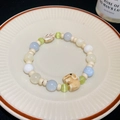 Beaded bracelet with light blue and cream stones featuring a cute elephant charm - Mixed Cat's Eye Stone / Colorful Elephant Style (17 Bracelet-Colorful)