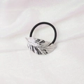 Detail of silver feather metal ornament on black elastic hair tie over white silk - Feather Shape (4) / Silver