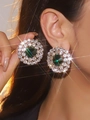 Luxury large round earrings with emerald green center stone and double halo crystals - Green Round Halo Style