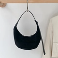 Black suede crescent shoulder bag with adjustable leather strap and silver metal zipper - Black