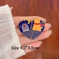 Detail showing two enamel pins forming a heart with rose, cat, and moon motifs, size 4x3.5cm - Moon and Cat Pair
