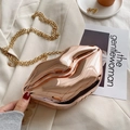 Lip-shaped rose gold acrylic clutch with metallic mirror finish and thin gold chain - Rose Gold