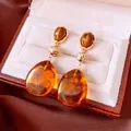 Vintage amber resin teardrop earrings with hammered gold studs in a jewelry box - Gold Amber (Silver Pin)