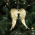 Golden angel wings Christmas tree ornament with elegant metallic finish and 14cm height - Wings Style