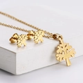 Golden titanium steel jewelry set featuring hollow Tree of Life necklace and earrings - Tree of Life