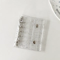 Detail der transparenten PVC-Einbandhülle mit silbernen Sternen und 6-Loch-Ringmechanik - Transparente Sterne (Nur Hülle)