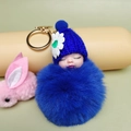 Cute dark blue faux fur pompom doll keychain with blue knitted hat and gold ring - Sapphire Blue