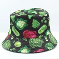 Detail shot of black bucket hat featuring vivid vegetable patterns and stitched brim - Black Vegetable Print