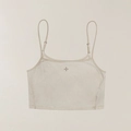 Detail of beige cropped sports vest featuring soft brushed fabric and a center cross logo - S / Annihilation White