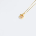 Elegant gold necklace featuring a flower pendant with a sparkling pink gemstone - Geometric Five-Pointed Star