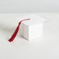 Minimalist white graduation cap gift box featuring a vibrant red tassel and cardstock texture - White Bachelor Cap Box