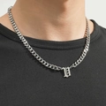 Silver stainless steel Cuban chain necklace with Gothic letter H pendant on model - Silver Letter V