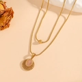 Double-layered gold sun pendant necklace featuring pink opal stone and elegant beads - Double Layer Sun Pendant Style / Gold Pink Cat's Eye (I616)