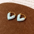 Close-up of gold plated heart hoop earrings with light blue marble enamel detail - Blue (Real Gold Plated)