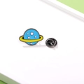Cute blue cartoon planet enamel pin with yellow ring and metal butterfly clasp - Planet (CZ0579)