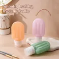 Three-piece set of popsicle-shaped silicone travel bottles in pink, orange, and green - Popsicle Shape / Mixed Colors / 60ML / 3pcs Set