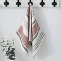 Detail of off-white waffle weave cotton towel with red and blue stripes on a wall hook - 34*74cm / Red
