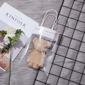 Brown bear-shaped towel gift in a transparent bag with a Just for you champagne ribbon - Coffee Bear With Ins Style Gift Bag