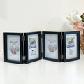 Black wooden 4x6 folding photo frame with four connected panels and metal hinges - Quadruple Fold - Black