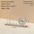 Golden metal HELLO letter clock with round wood grain dial on a solid wood base - Gold HELLO