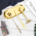Kit d'accessoires de bougie doré avec coupe-mèche et éteignoir sur un plateau - Ensemble d'Outils pour Bougies 4 Pièces Doré