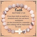 Pink zebra stone beaded bracelet with white cross charm on a decorative faith message card - Cross With Faith Card Style
