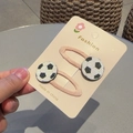 Pair of girls' hair clips featuring glittery soccer ball motifs on pink fabric bands - Soccer Ball (Pair)