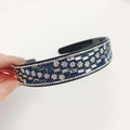 Sparkling black headband with deep blue rhinestones and silver crystal floral patterns - White Crystal Navy