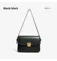 Vue détaillée du sac porté épaule en cuir noir avec élégant fermoir carré en métal et fine lanière. - Noir