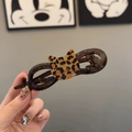 Detail of leopard print cat head ornament on brown acrylic large shark hair claw clip - 11cm / Twist Clip Cat Shape Leopard
