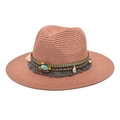 Detail of woven straw fedora featuring bohemian beads, turquoise stone and grey fringe - Dusty Pink