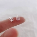 Pink square gemstone silver earrings with beaded frame detail held on a fingertip - Square Pink Main Stone Style (A220)